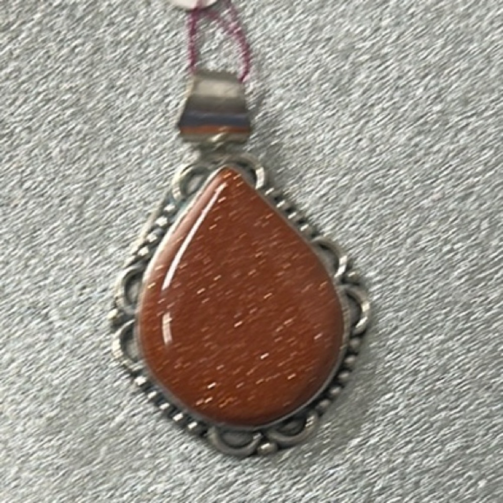 Silver and Orange Cinnamon colored Pendant
